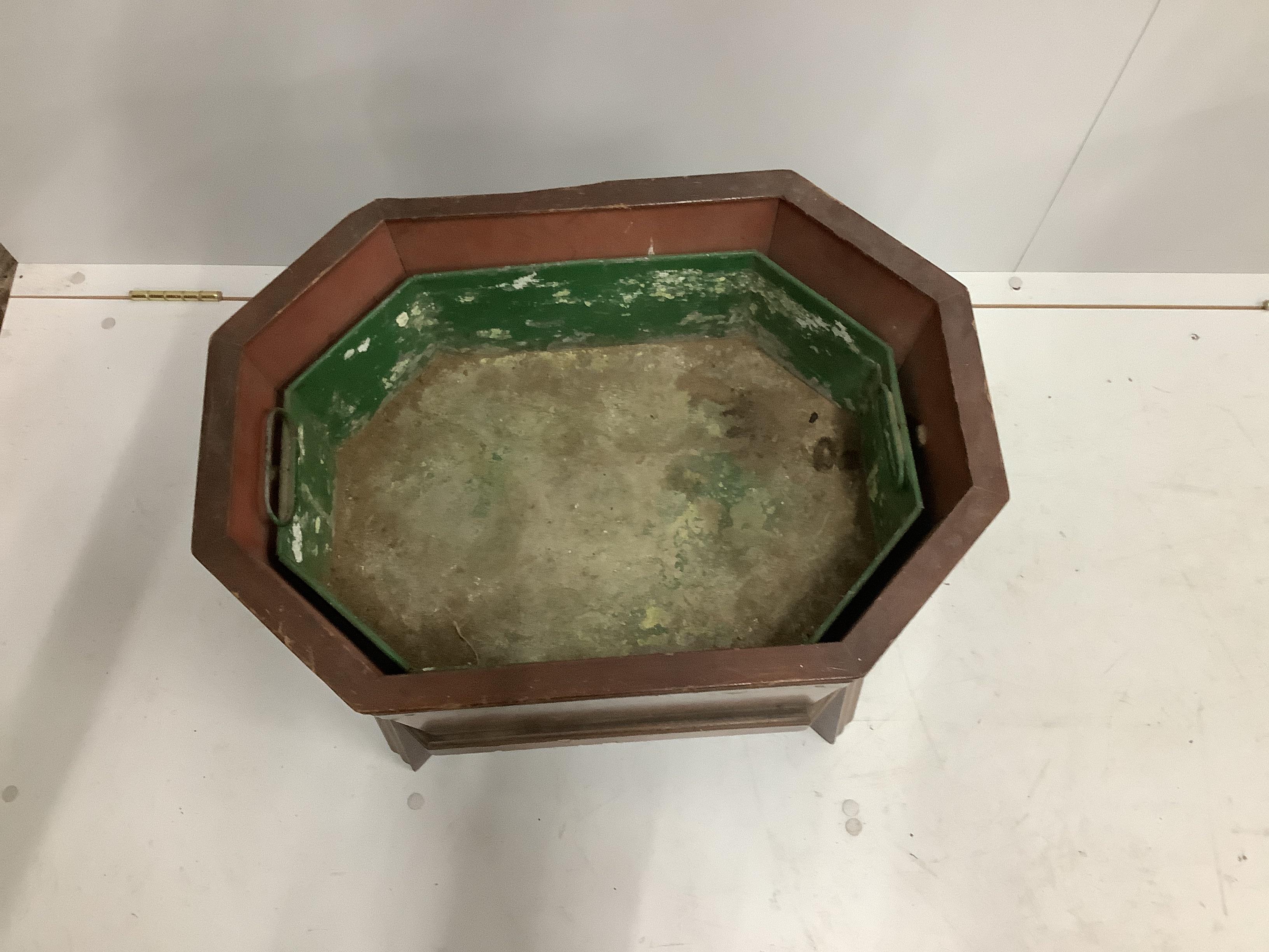 A George III style brass bound octagonal mahogany wine cooler, width 54cm, depth 39cm, height 49cm